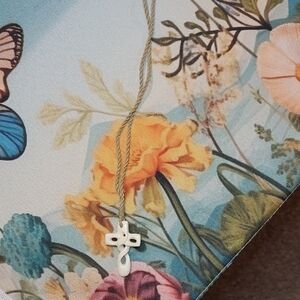 NWOT Carved Ivory Cross With Rope And Adjustable Bead